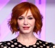 fans are framing christina hendricks new photo with iconic rock singer