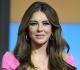 elizabeth hurley sizzles in two piece swimsuit to make up for missed bikini day