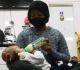 in taiwan migrants flee oppressive workplaces for life on the periphery