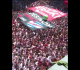 crowds hold destroy israel banner at spain s plona bull run