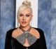 christina aguilera 44 wears nothing but leather lingerie in racy photos