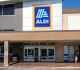 aldi s cozy throw blanket is perfect for creating a soft layered look on your bed this fall