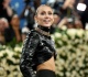 how miley cyrus isn t getting distracted by her ongoing family drama source exclusive
