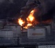 fires ignited by ukrainian drones rage at russian oil refinery