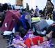 nearly half a million afghans return from iran after crackdown