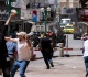 israeli forces raid foreign exchange shops in occupied west bank one dead