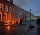 protesters torch cars buildings in belfast after knife attack