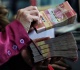 indonesia s anti graft prosecutor quits after police seize gold and cash