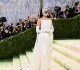 4 years later iconic california gurls singer returned to the met gala in a striking mirrored mask