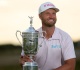 clark wins second us open trophy despite hecklers