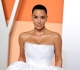 kim kardashian little to the imagination in shredded lingerie during venice outing
