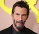 keanu reeves and his girlfriend gray haired goddess alexandra grant hold hands on the red carpet