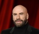 john travolta debuts new look alongside his stunning daughter ella bleu on the red carpet