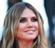 heidi klum s revealing dress rocks the red carpet alongside her handsome son henry
