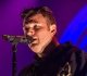 beloved rocker returns to the stage in a wheelchair and the emotional moment left him in tears