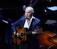 music icon paul simon brings the crowd to tears as they all join in on singing what a masterpiece