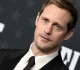 handsome alexander skarsgard s shiny purple crop top on red carpet has fans doing a double take